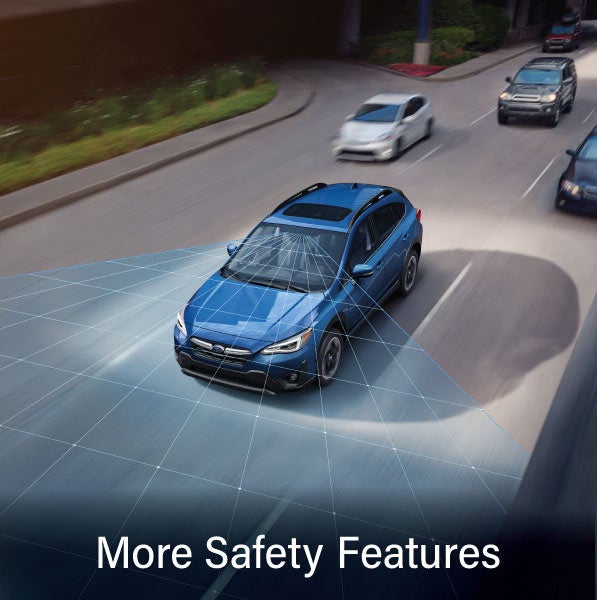 A Subaru Crosstrek in blue with the words “More Safety Features“. | Royal Moore Subaru in Hillsboro OR