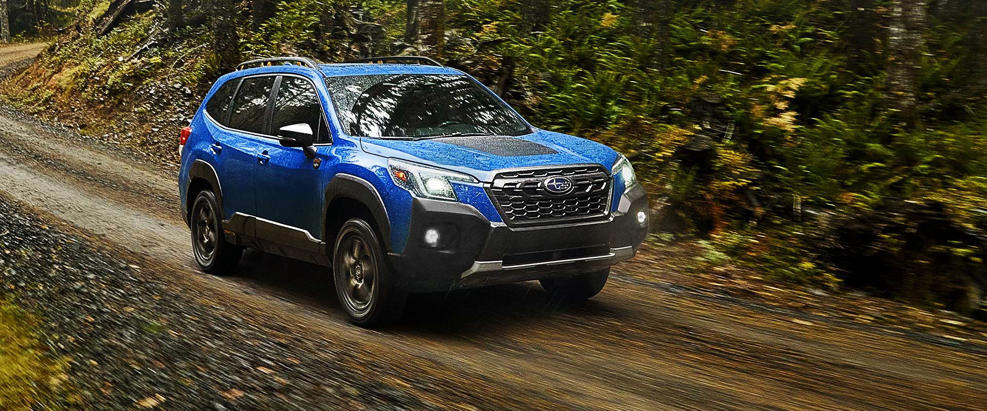 A 2022 Forester driving on a highway. | Royal Moore Subaru in Hillsboro OR