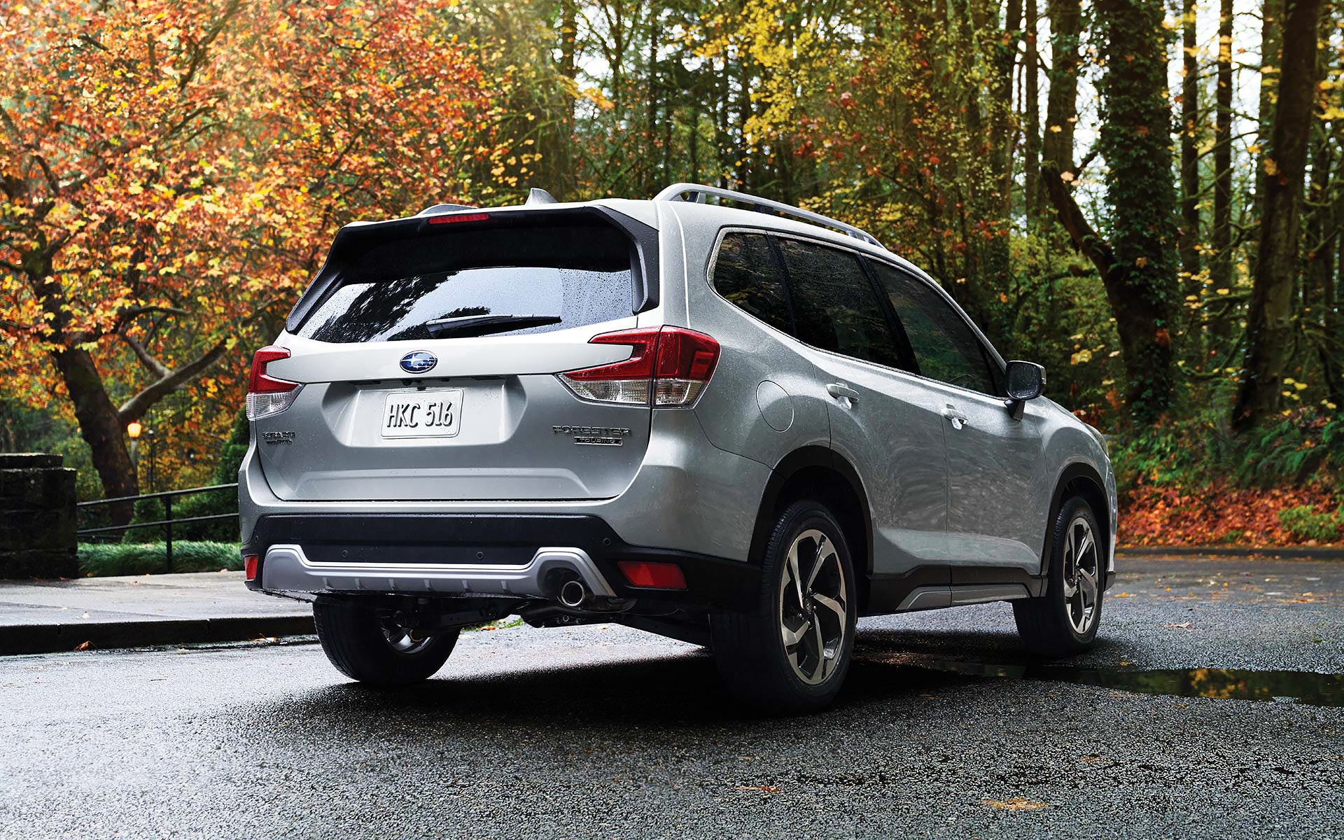 The rear of the 2022 Forester on a neighborhood street. | Royal Moore Subaru in Hillsboro OR