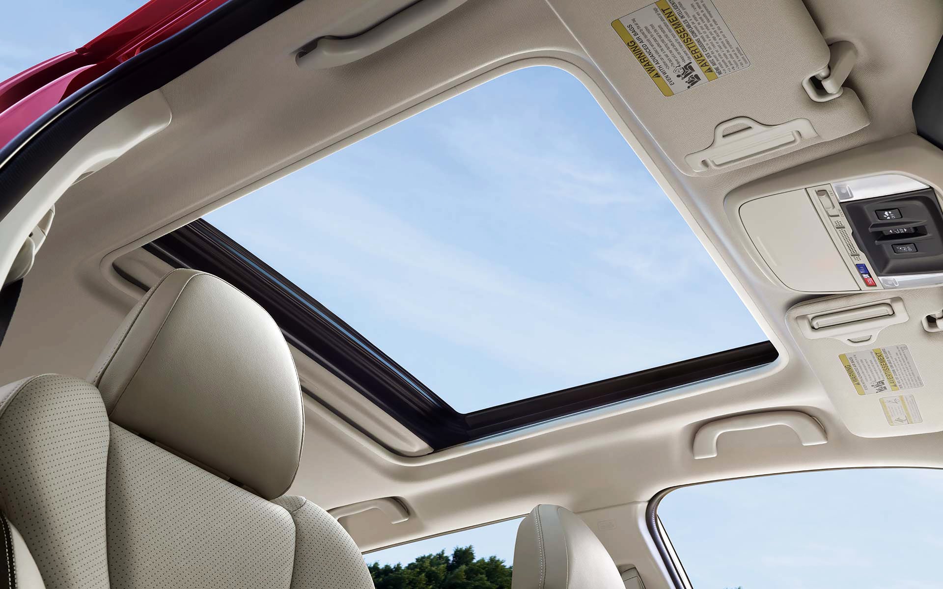 A view through the power sliding panoramic moonroof on the 2022 Forester Sport. | Royal Moore Subaru in Hillsboro OR