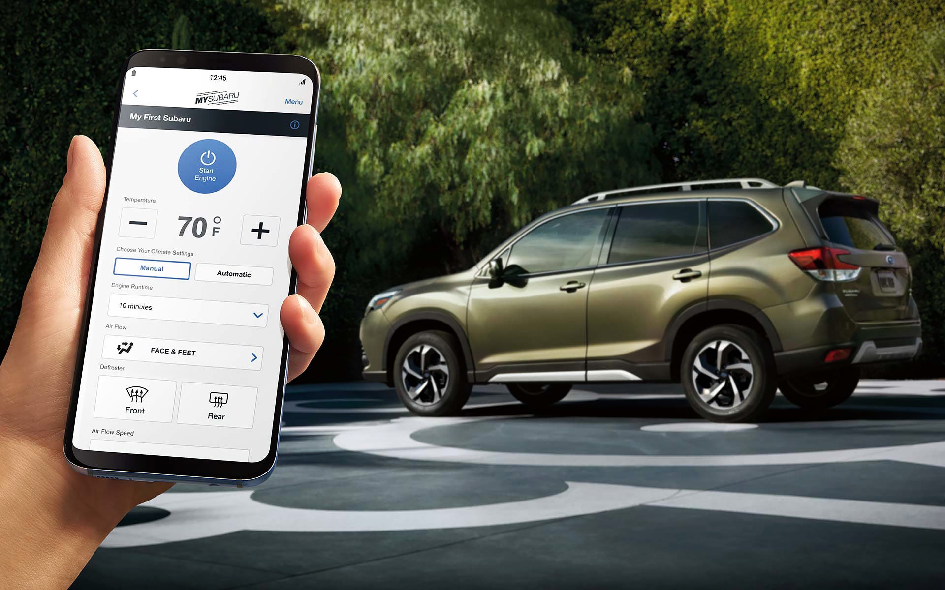 A close-up of a phone showing the Remote Engine Start with Climate Control feature of SUBARU STARLINK® Safety and Security available on the 2022 Forester. | Royal Moore Subaru in Hillsboro OR