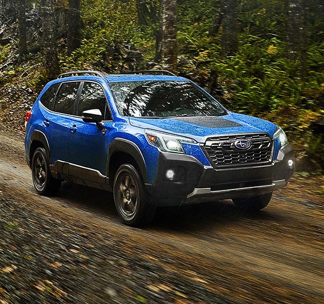 A 2022 Forester driving on a highway. | Royal Moore Subaru in Hillsboro OR
