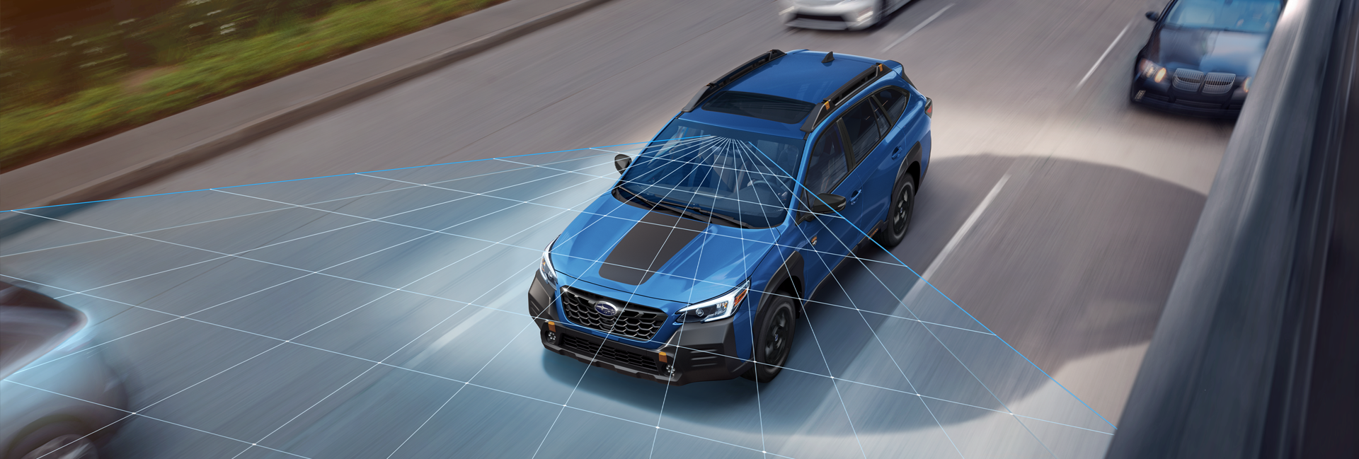 A photo illustration of the EyeSight Driver Assist Technology on the 2023 Outback Wilderness. | Royal Moore Subaru in Hillsboro OR